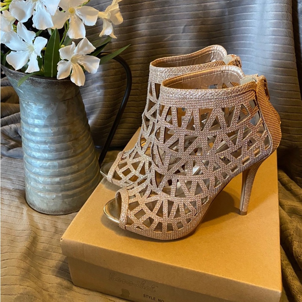 Gold high heel shoes